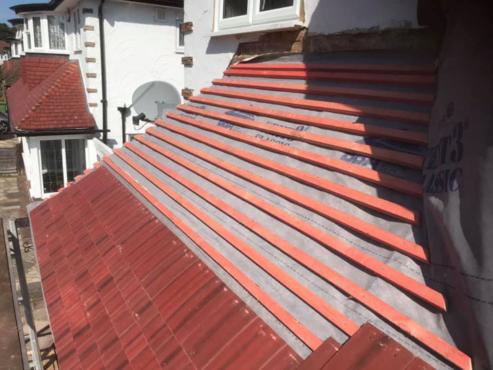 Sidcup - new rustic red tiled bay to match main roof already completed by us