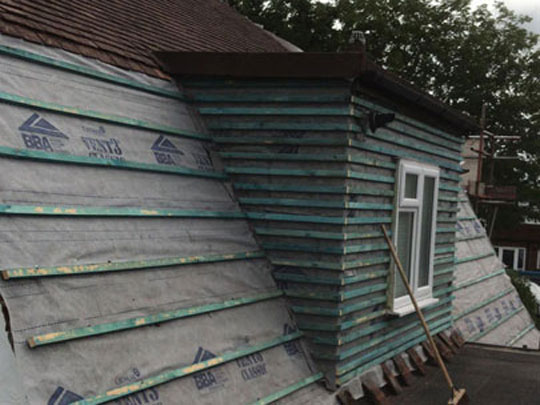 Petts Wood - new brekland brown roof including new black upvc all round